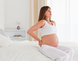 Болит спина после сна при беременности